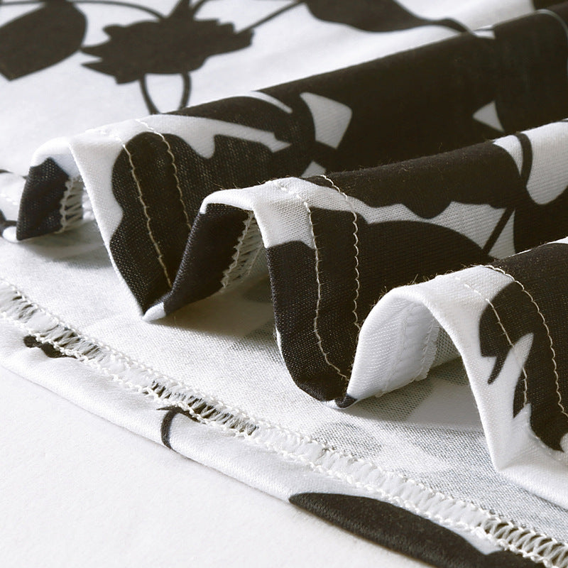 Schwarz-weißes, ärmelloses, ausgestelltes Blumenkleid <br> Übergrößen