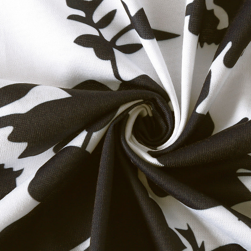 Schwarz-weißes, ärmelloses, ausgestelltes Blumenkleid <br> Übergrößen
